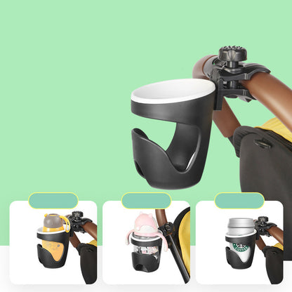 Black bicycle cup holder attached to a bike frame with a green background
