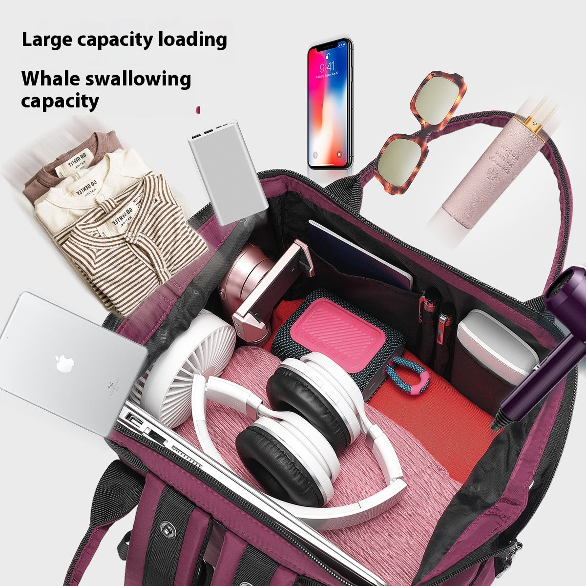 Open suitcase with various items including a phone, clothes, and electronic devices on a white background.