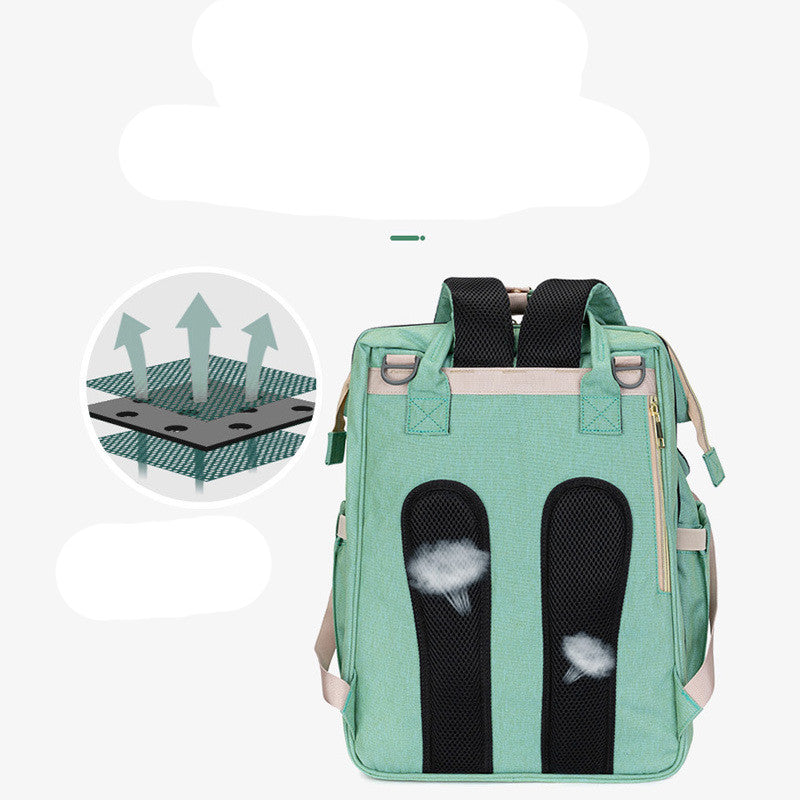 Green backpack with black accents on a white background