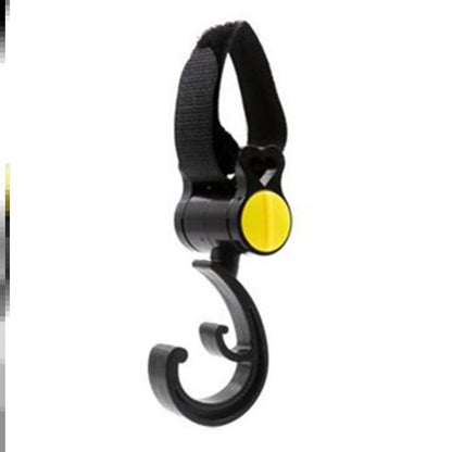 Black and yellow hook with a strap on a white background