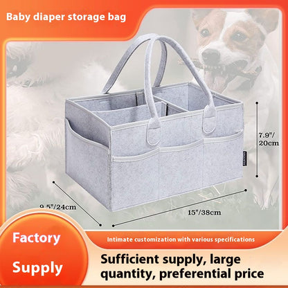 Mummy diaper organizer bag showing multiple compartments for diapers and wipes