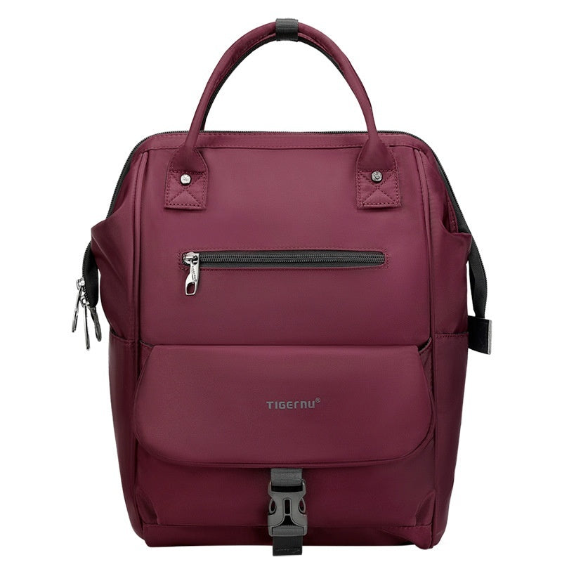 Maroon backpack with visible brand logo on a white background