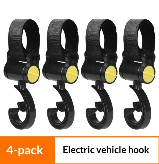 Four black electric vehicle hooks with yellow centers on a white background