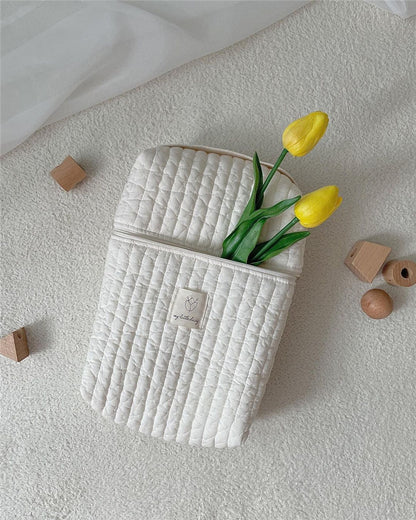 Mommy's diaper bag showing organized interior pockets and storage sections