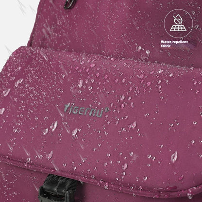 Purple bag with water droplets showing water-repellent fabric, featuring the Tigernu brand.