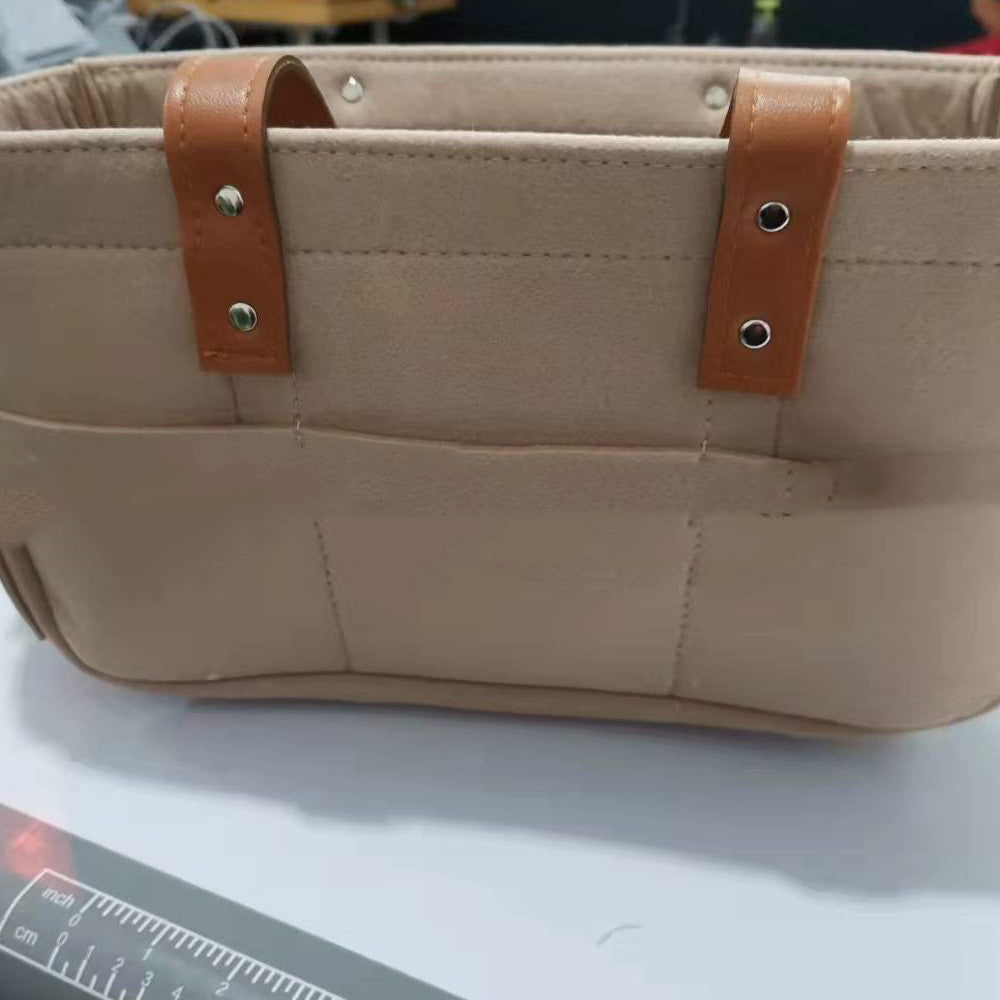 Baby stroller felt bag demonstrating easy attachment to stroller handlebar