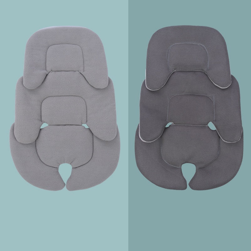 Soft padded stroller cushion with safety harness openings for newborn